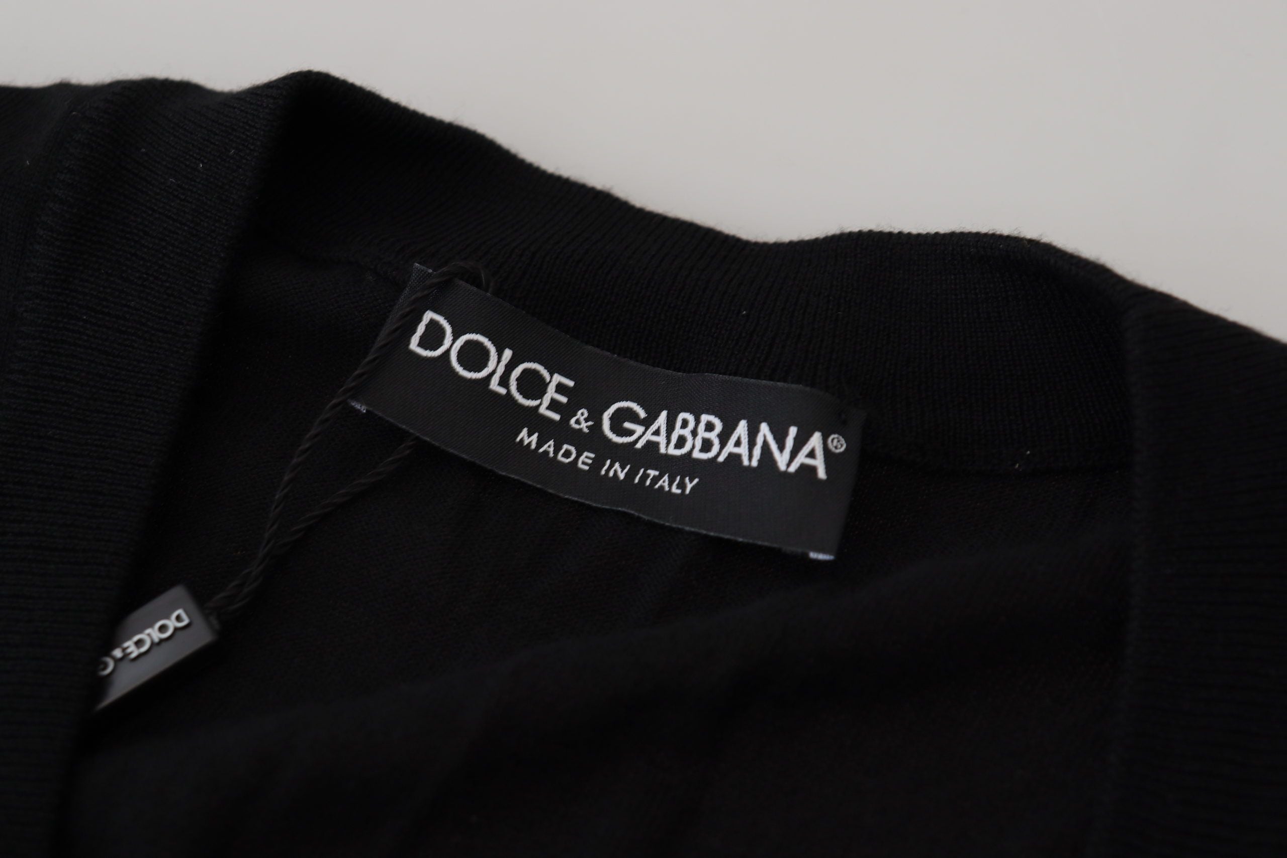 Черен вълнен пуловер с копчета на Dolce & Gabbana