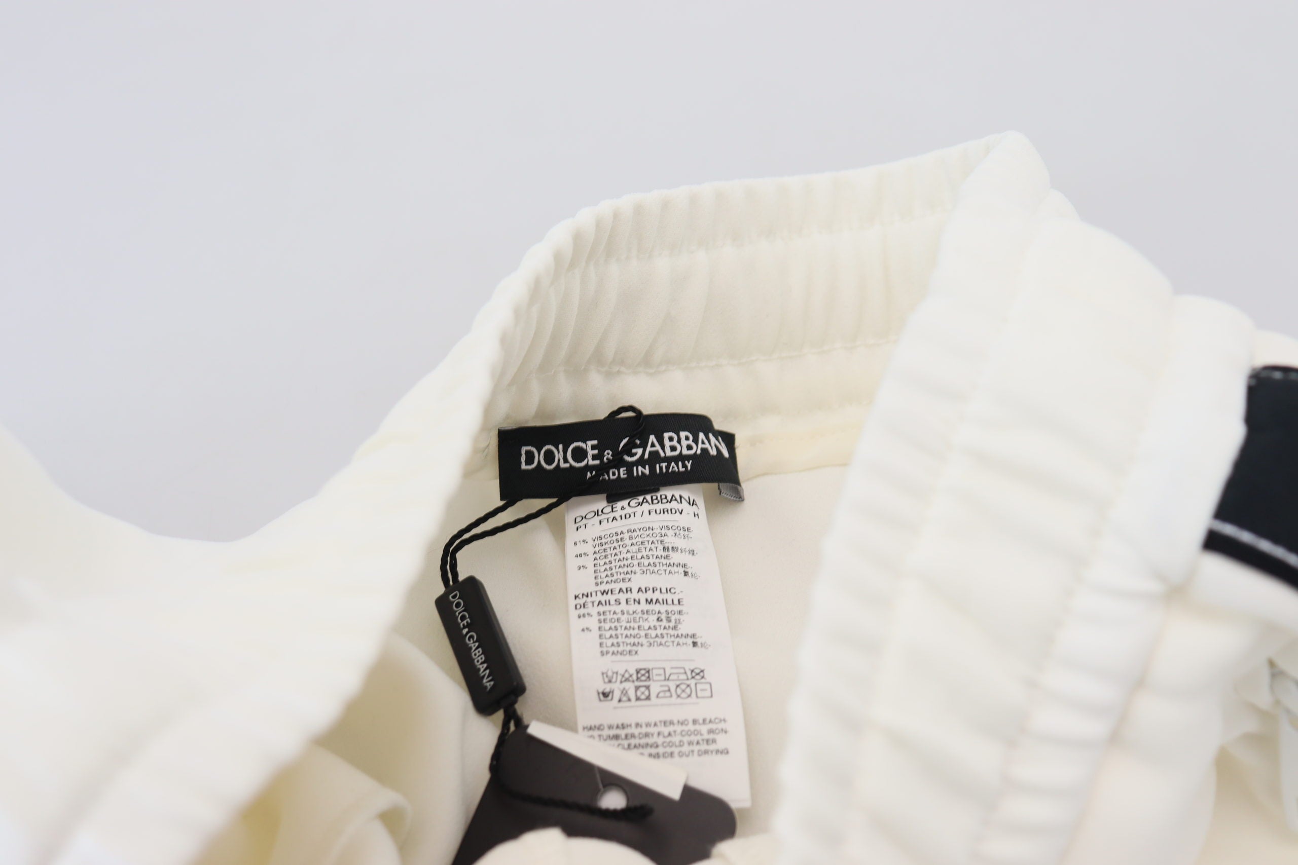 Бели спортни панталони с лого Dolce & Gabbana DG