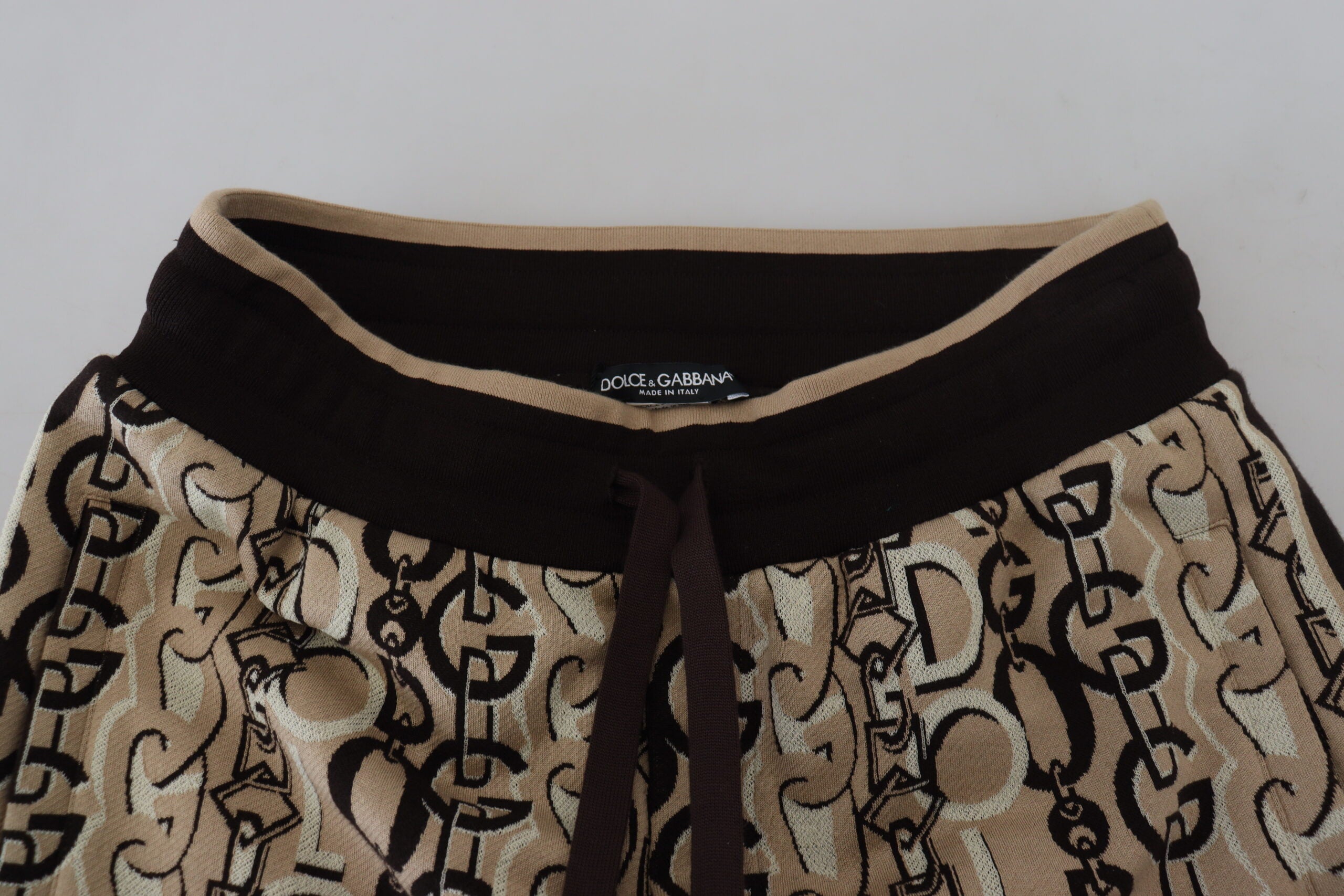 Памучни джогинг панталони Dolce &amp; Gabbana с бежов принт на лого
