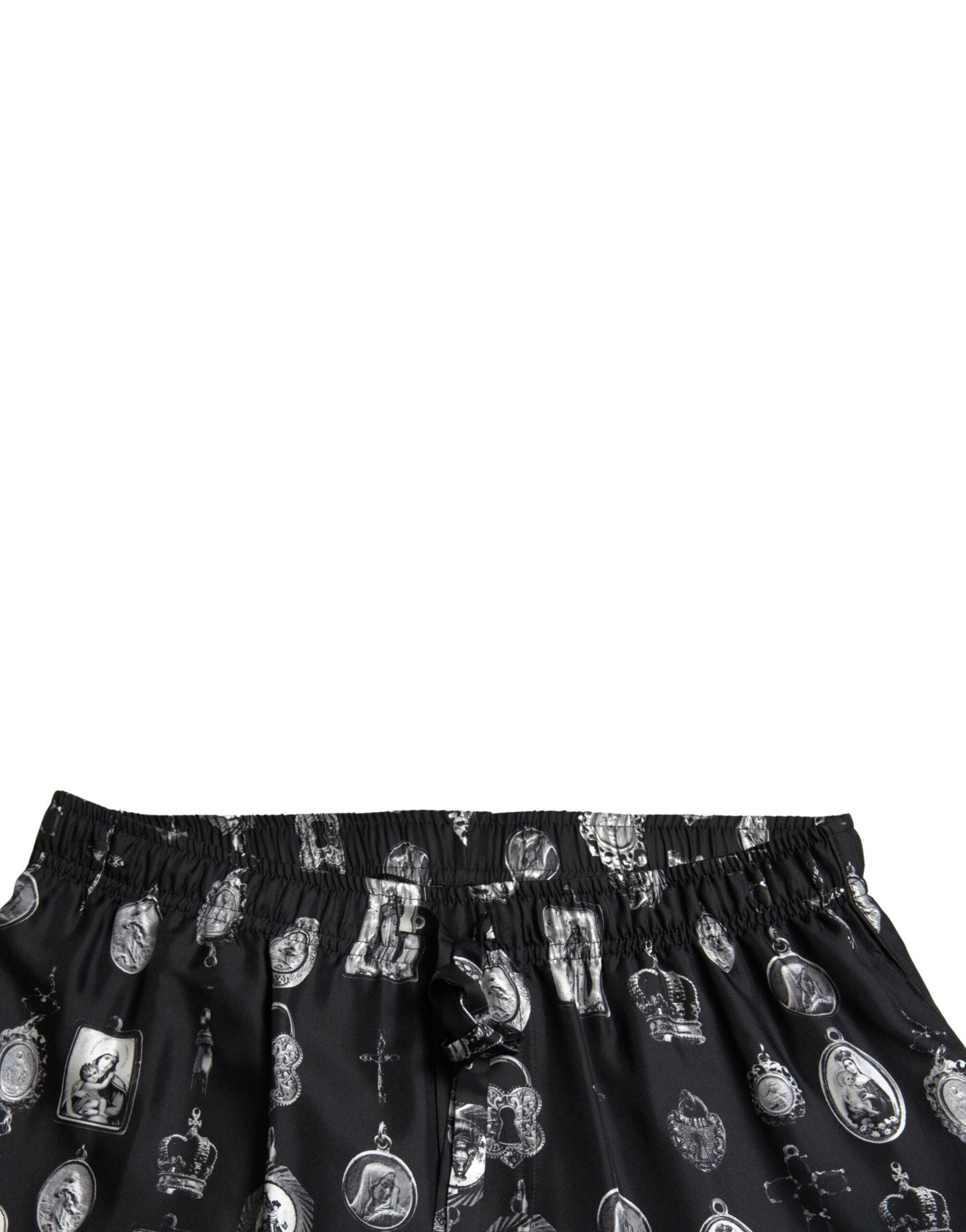 Копринени мъжки панталони Dolce &amp; Gabbana с черни религиозни щампи