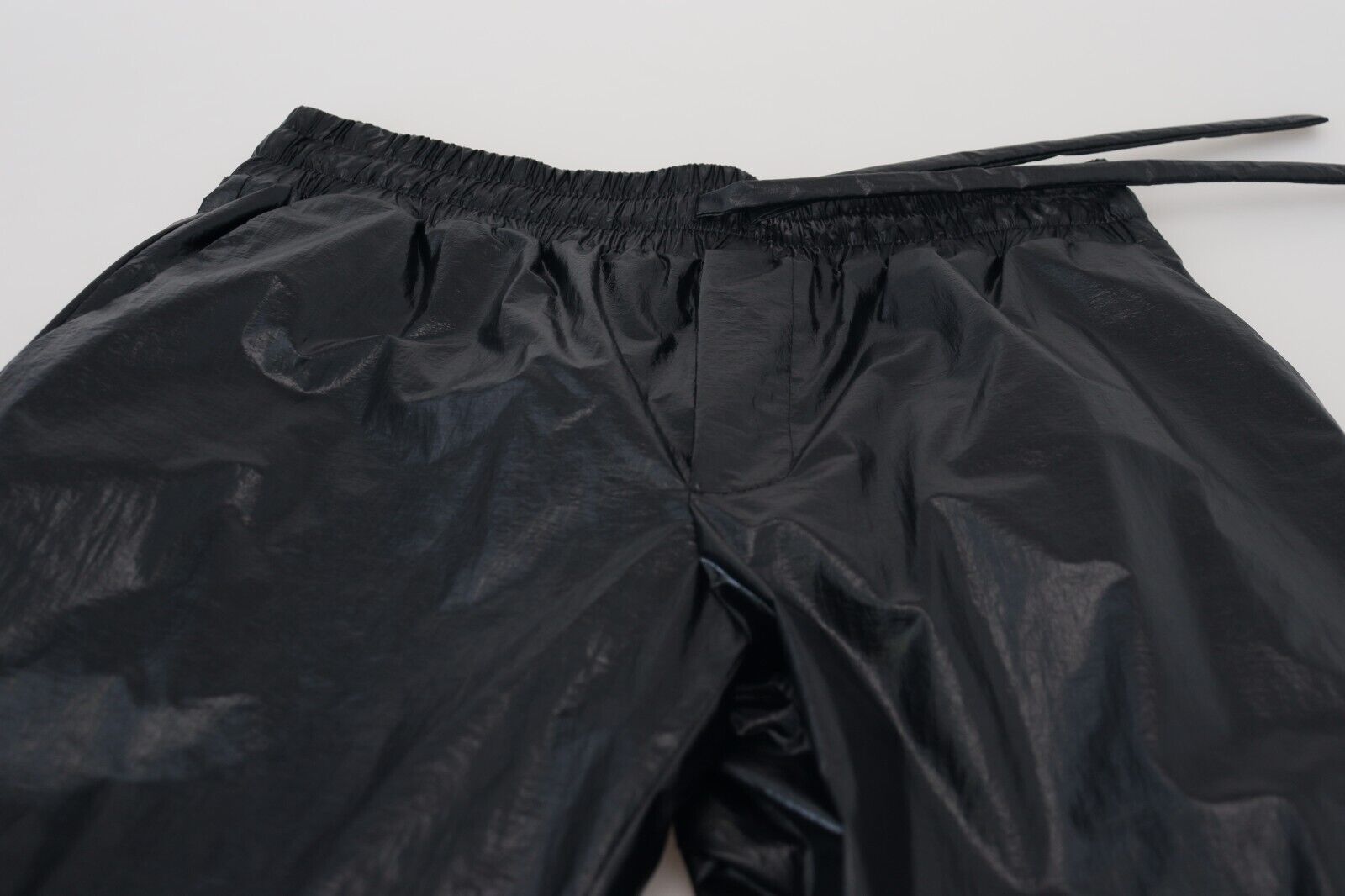Dolce &amp; Gabbana черни блестящи панталони с връзки, найлонови панталони